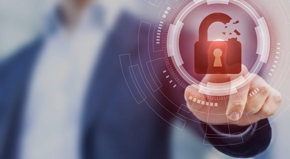 Security breach, system hacked, internet cyber attack alert with red broken padlock icon showing unsecured data, vulnerable access, compromised password, virus infection, businessman touching icon Security breach, system hacked, internet cyber attack alert with red broken padlock icon showing unsecured data, vulnerable access, compromised password, virus infection, businessman touching icon